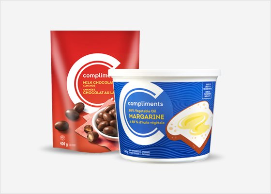 Des amandes enrobées de chocolat au lait Compliments et de la margarine Compliments.